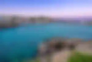 Blick auf den Hafen und die Küste von Cala Ratjada