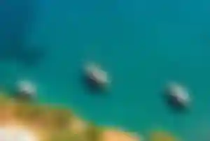 Dalaman Küste mit türkisblauem Wasser und Booten für Last Minute Türkei All Inclusive Urlaub